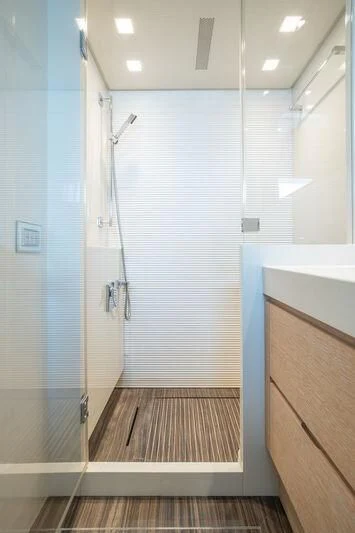 a shower unit in a bathroom aboard INDIGO Yacht for Sale