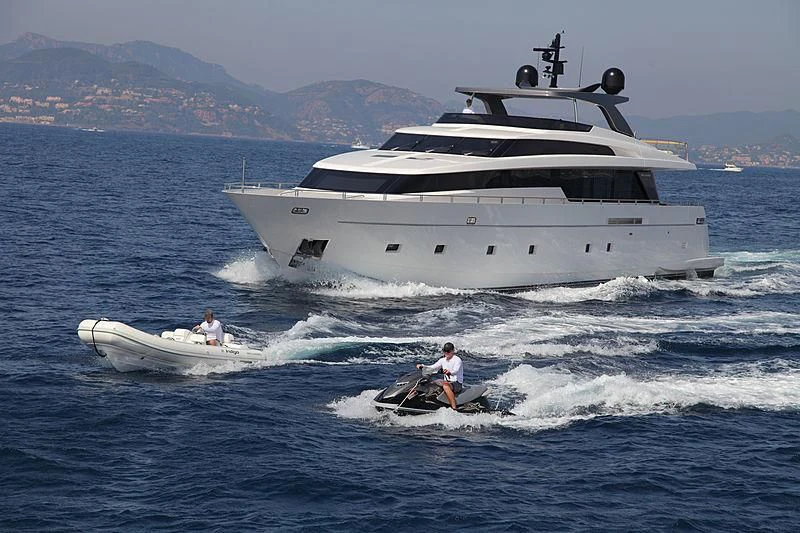 a boat with a helicopter on it aboard INDIGO Yacht for Sale