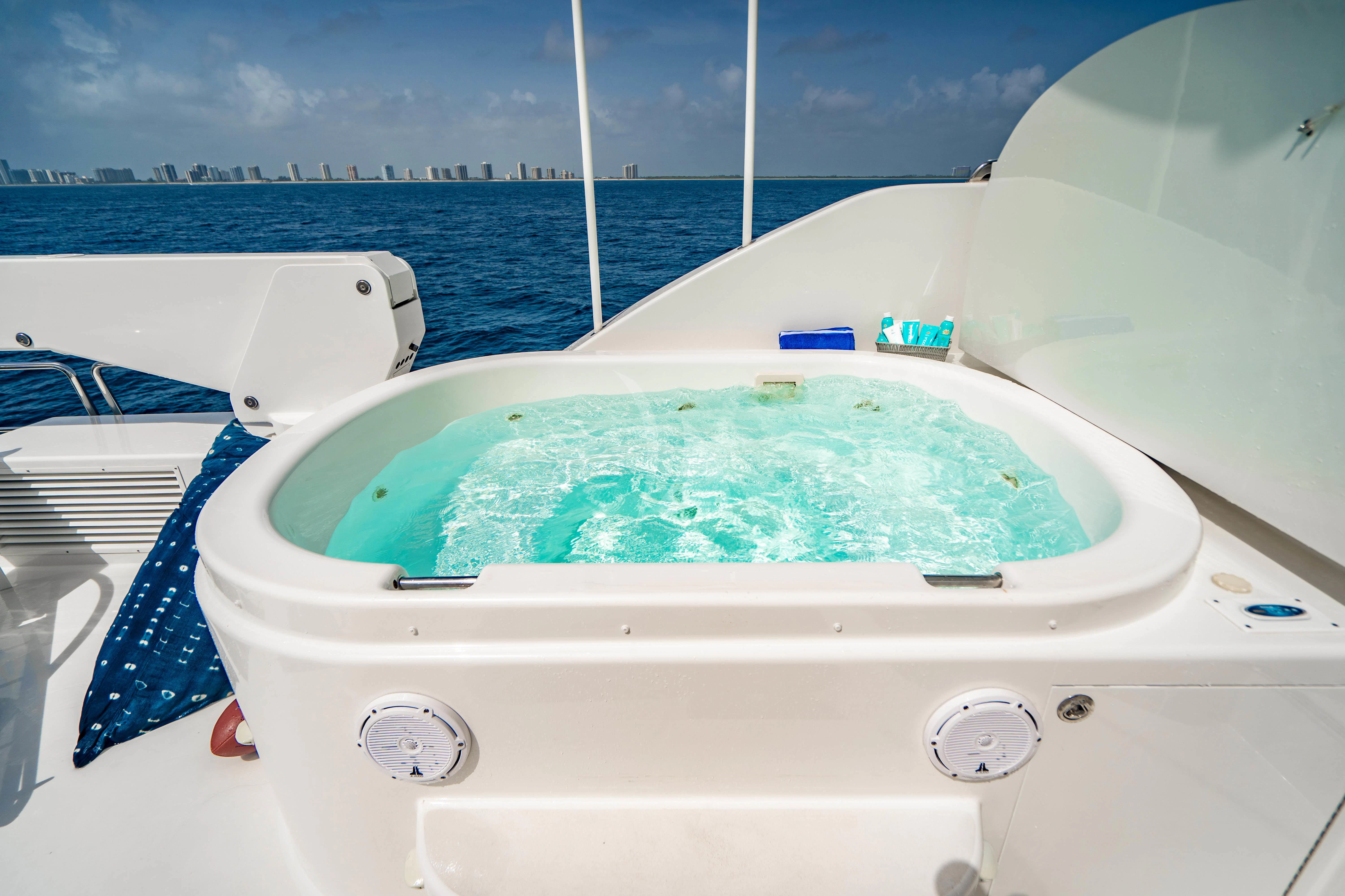a white tub on a boat aboard INDIGO Yacht for Sale