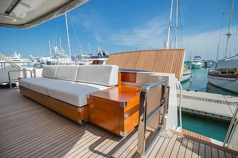 a boat dock with boats aboard INDIGO Yacht for Sale