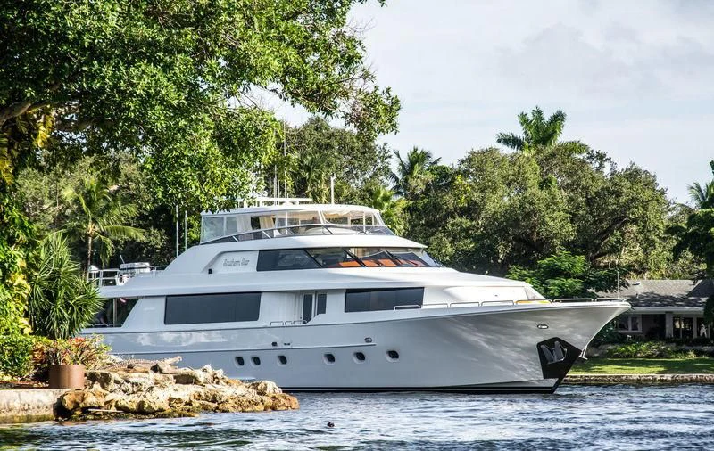a white yacht on the water aboard INDIGO Yacht for Sale