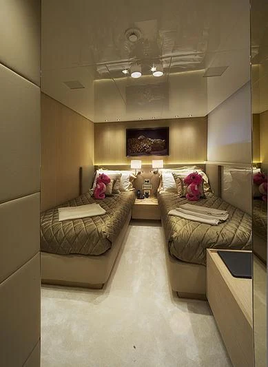 a room with couches and a table aboard INDIGO Yacht for Sale