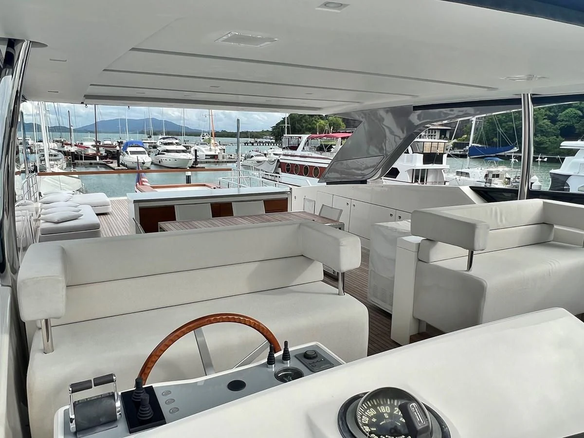 a room with a large window and a view of the city aboard INDIGO Yacht for Sale