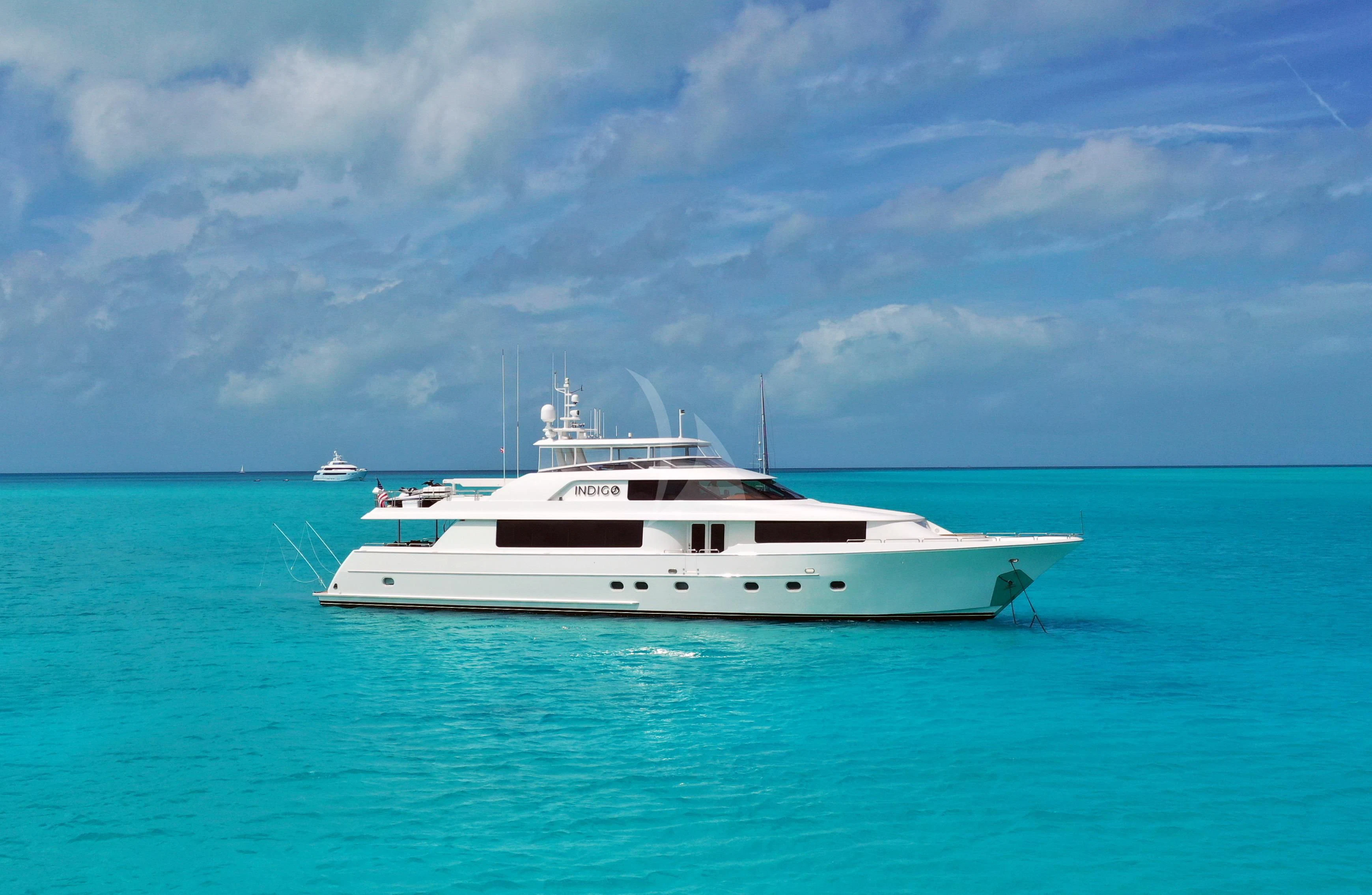 a white boat in the water aboard INDIGO Yacht for Sale