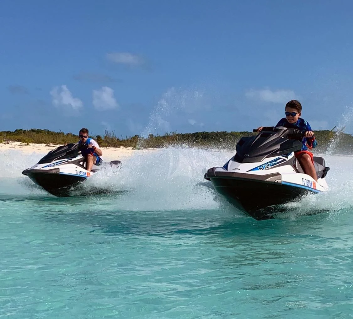 a group of people on a boat aboard INDIGO Yacht for Sale