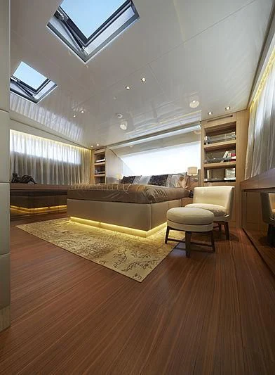 a living room with a couch and a tv aboard INDIGO Yacht for Sale