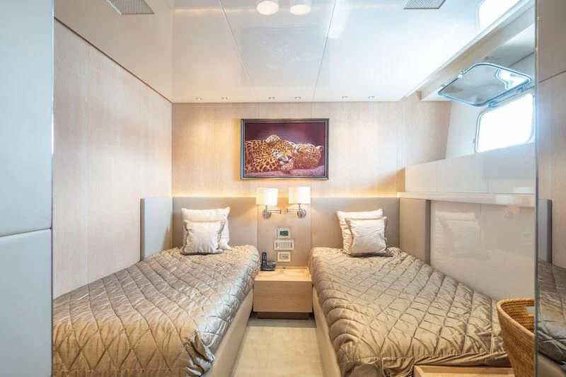 a couple of beds in a room aboard INDIGO Yacht for Sale