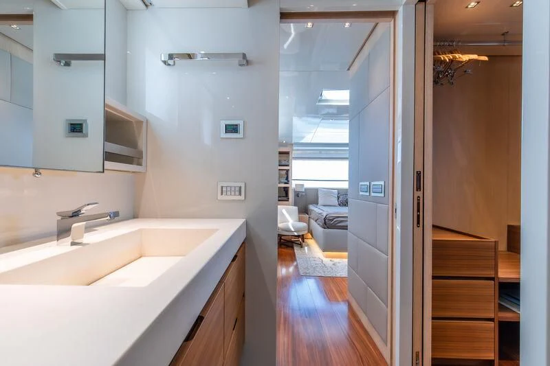 a bathroom with a sink and a mirror aboard INDIGO Yacht for Sale