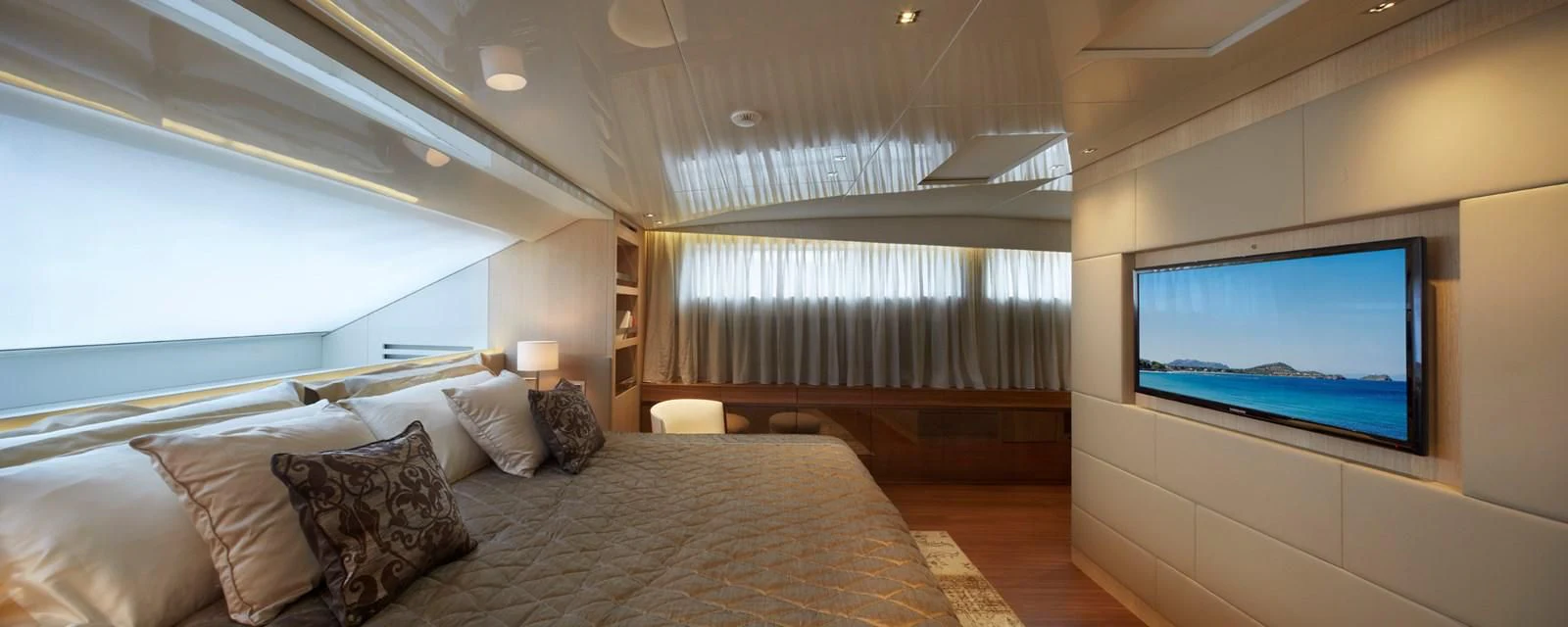 a bed with pillows and pillows aboard INDIGO Yacht for Sale