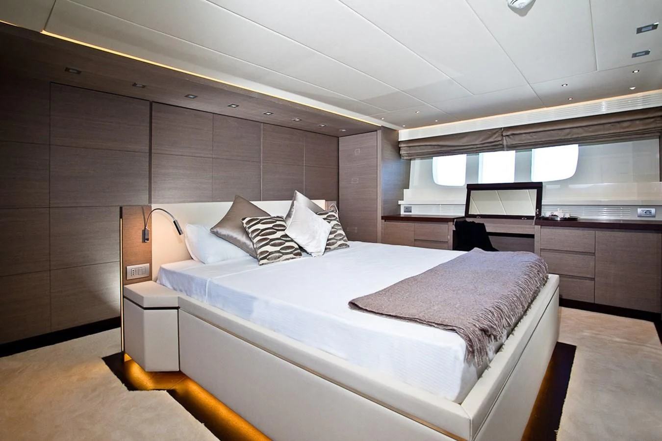 a bed in a room aboard DADDY'S DREAM 888 Yacht for Charter