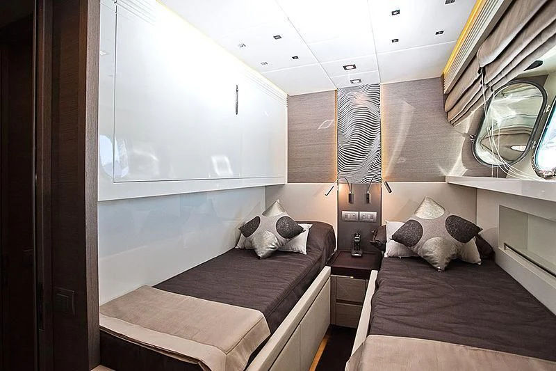 a bed in a room aboard DADDY'S DREAM 888 Yacht for Charter