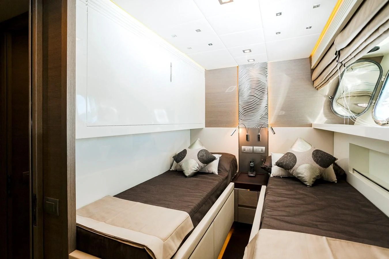 a couple of beds in a room aboard DADDY'S DREAM 888 Yacht for Charter