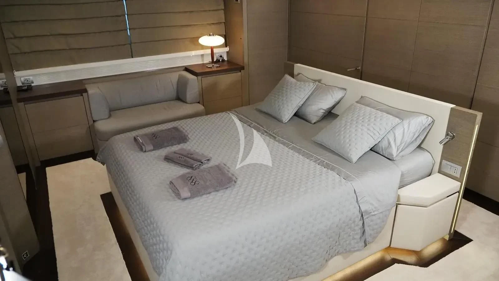 a bed with white sheets aboard DADDY'S DREAM 888 Yacht for Charter
