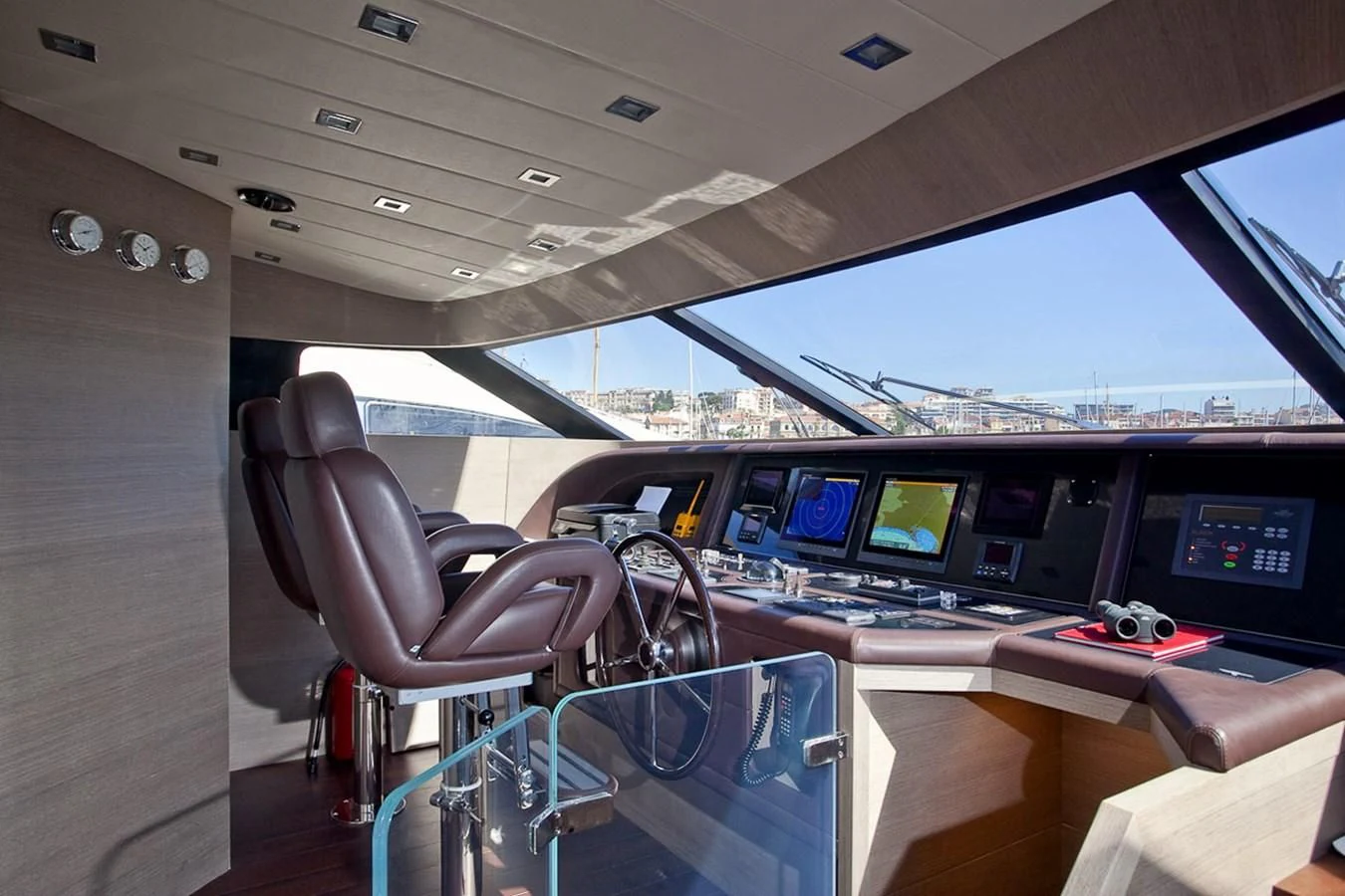 inside of a vehicle with many monitors aboard DADDY'S DREAM 888 Yacht for Charter