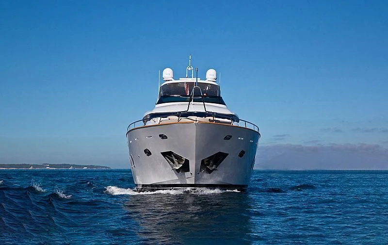 a white boat in the water aboard DADDY'S DREAM 888 Yacht for Charter