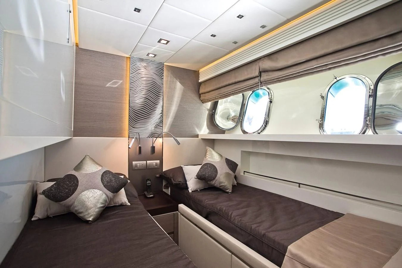 a room with a bed and a window aboard DADDY'S DREAM 888 Yacht for Charter