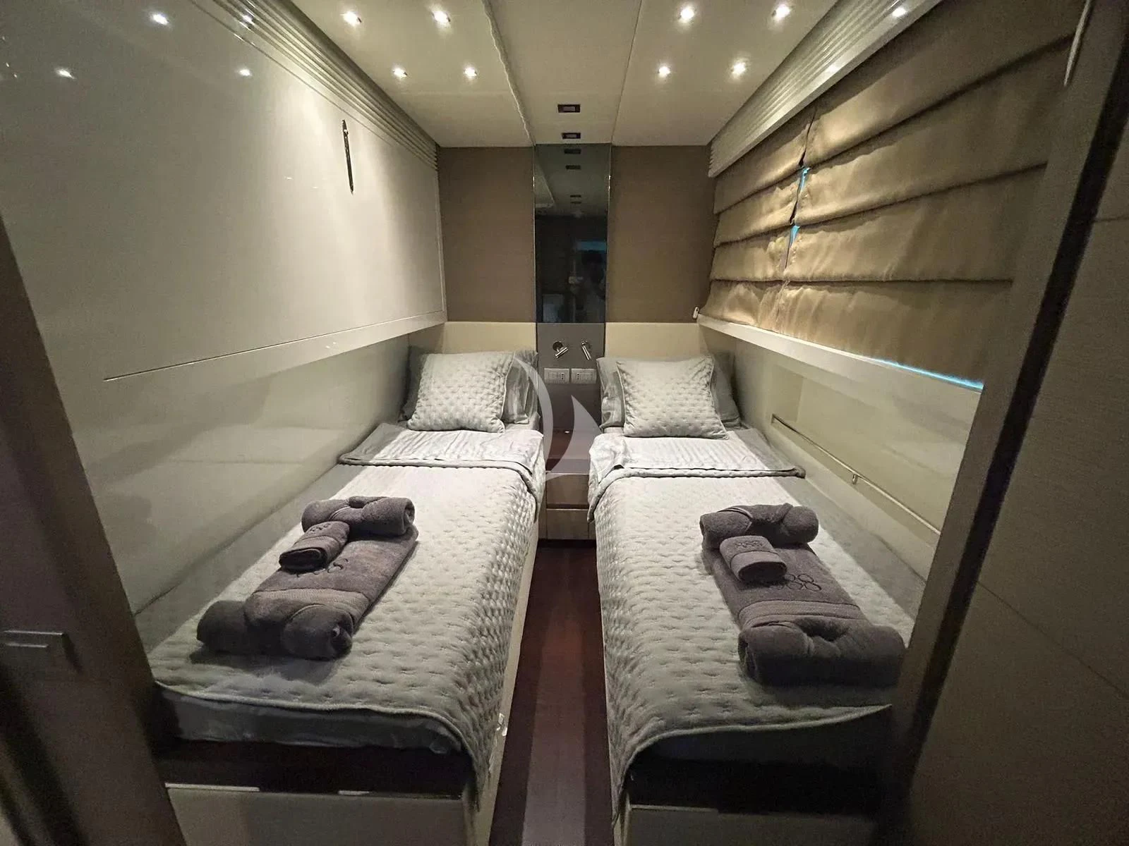 a couple of beds in a hotel room aboard DADDY'S DREAM 888 Yacht for Charter