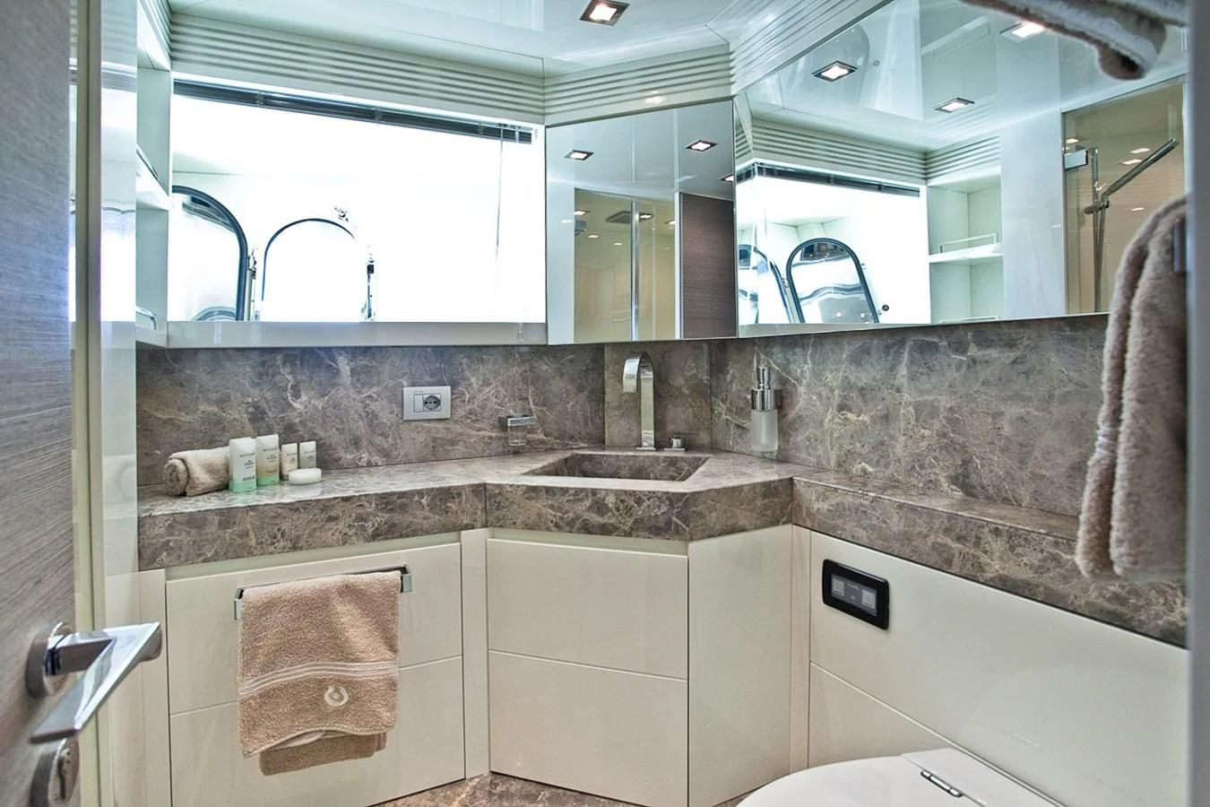 a bathroom with a marble counter top aboard DADDY'S DREAM 888 Yacht for Charter