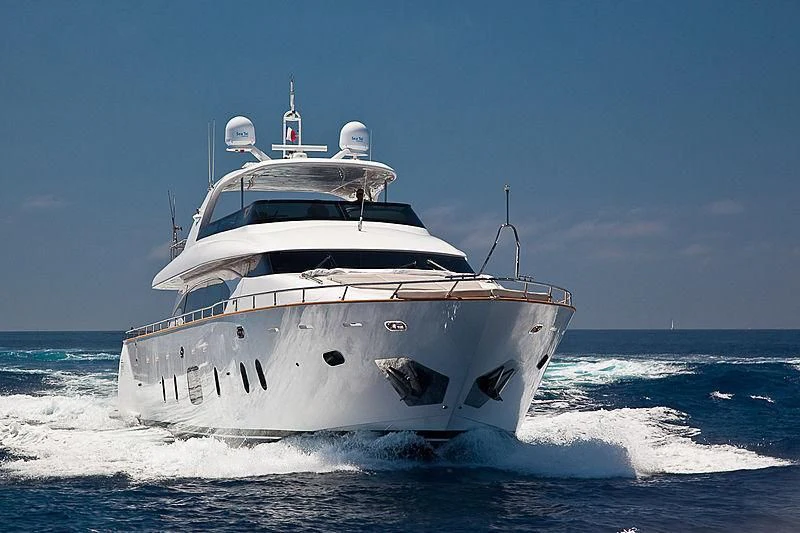 a white boat in the water aboard DADDY'S DREAM 888 Yacht for Charter
