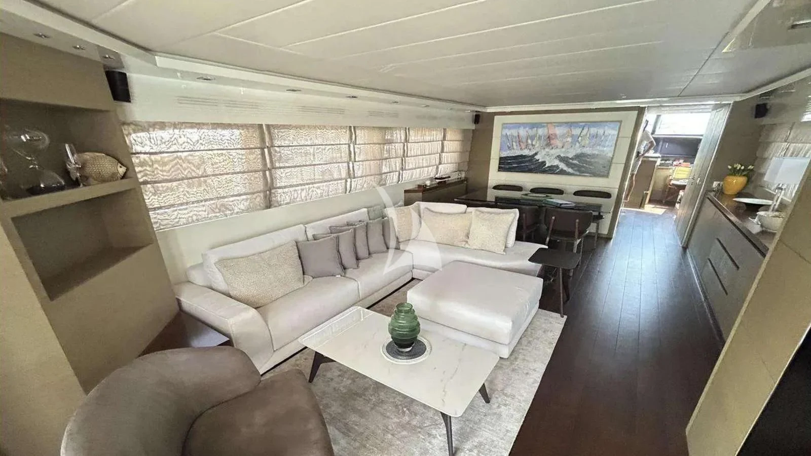 a living room with a large screen aboard DADDY'S DREAM 888 Yacht for Charter