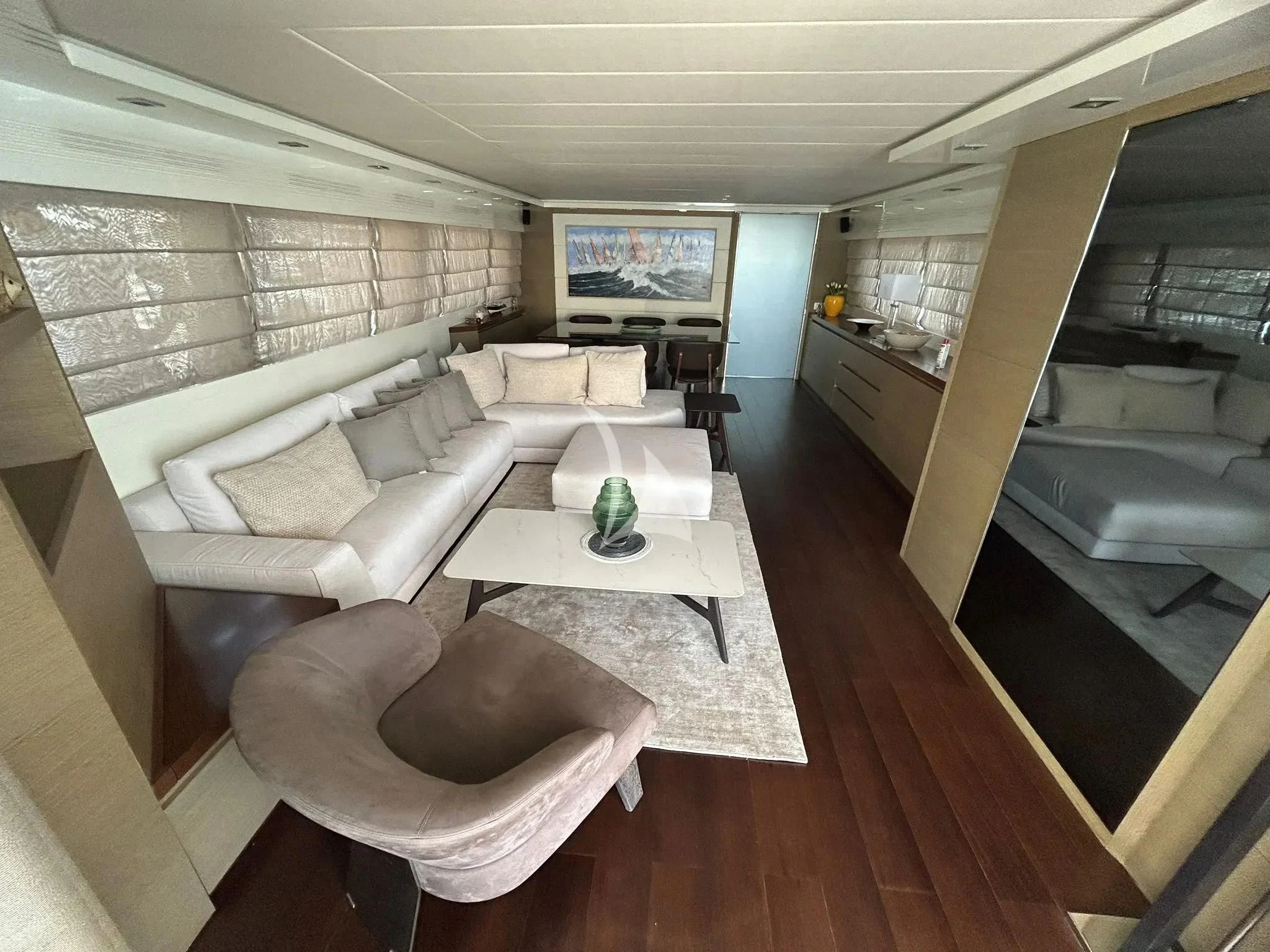 a living room with a couch and a table aboard DADDY'S DREAM 888 Yacht for Charter