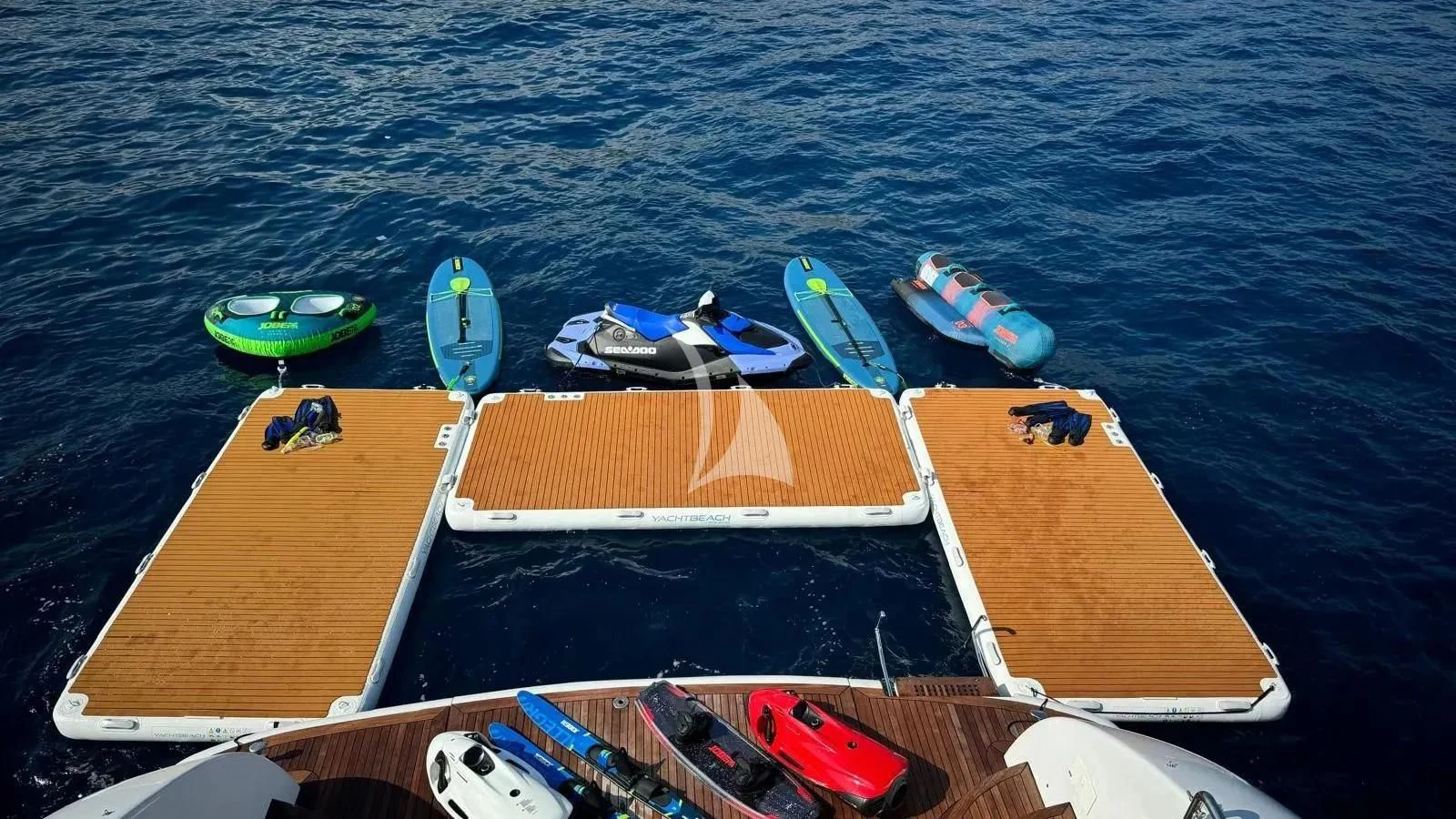 a group of boats on a body of water aboard DADDY'S DREAM 888 Yacht for Charter