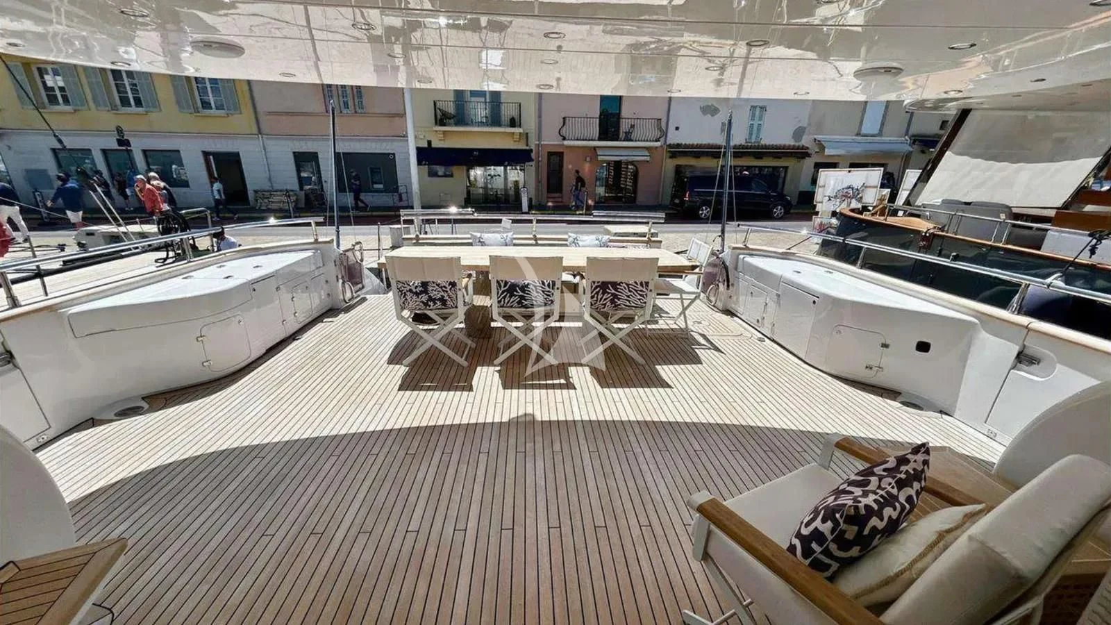 a large room with tables and chairs aboard DADDY'S DREAM 888 Yacht for Charter