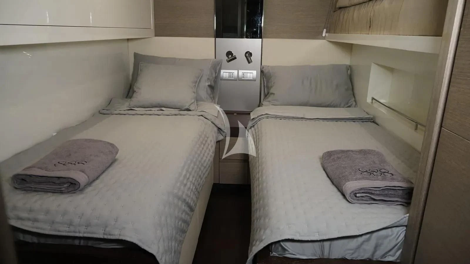 a couple of beds in a room aboard DADDY'S DREAM 888 Yacht for Charter