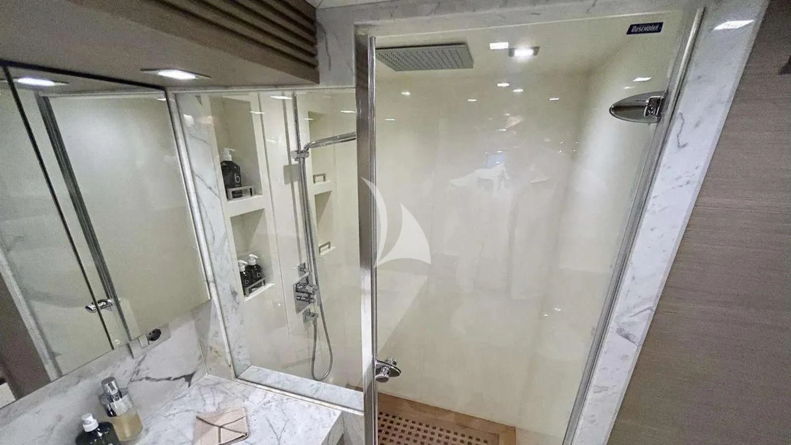 a bathroom with a large shower aboard DADDY'S DREAM 888 Yacht for Charter