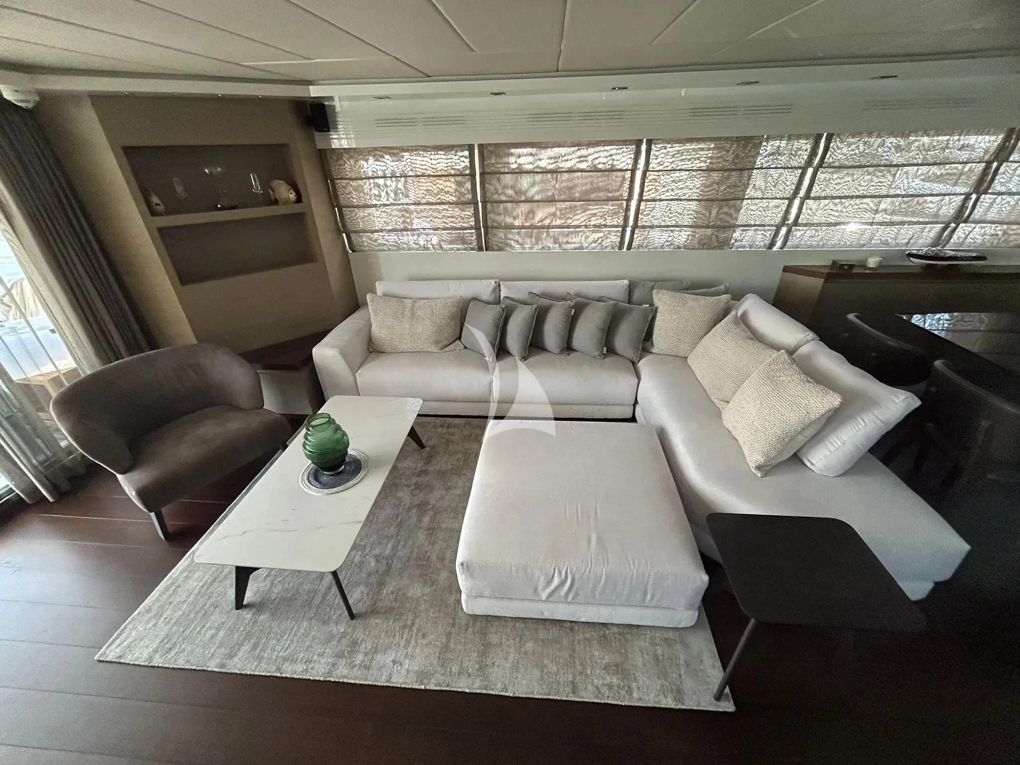 a living room with a couch and a coffee table aboard DADDY'S DREAM 888 Yacht for Charter