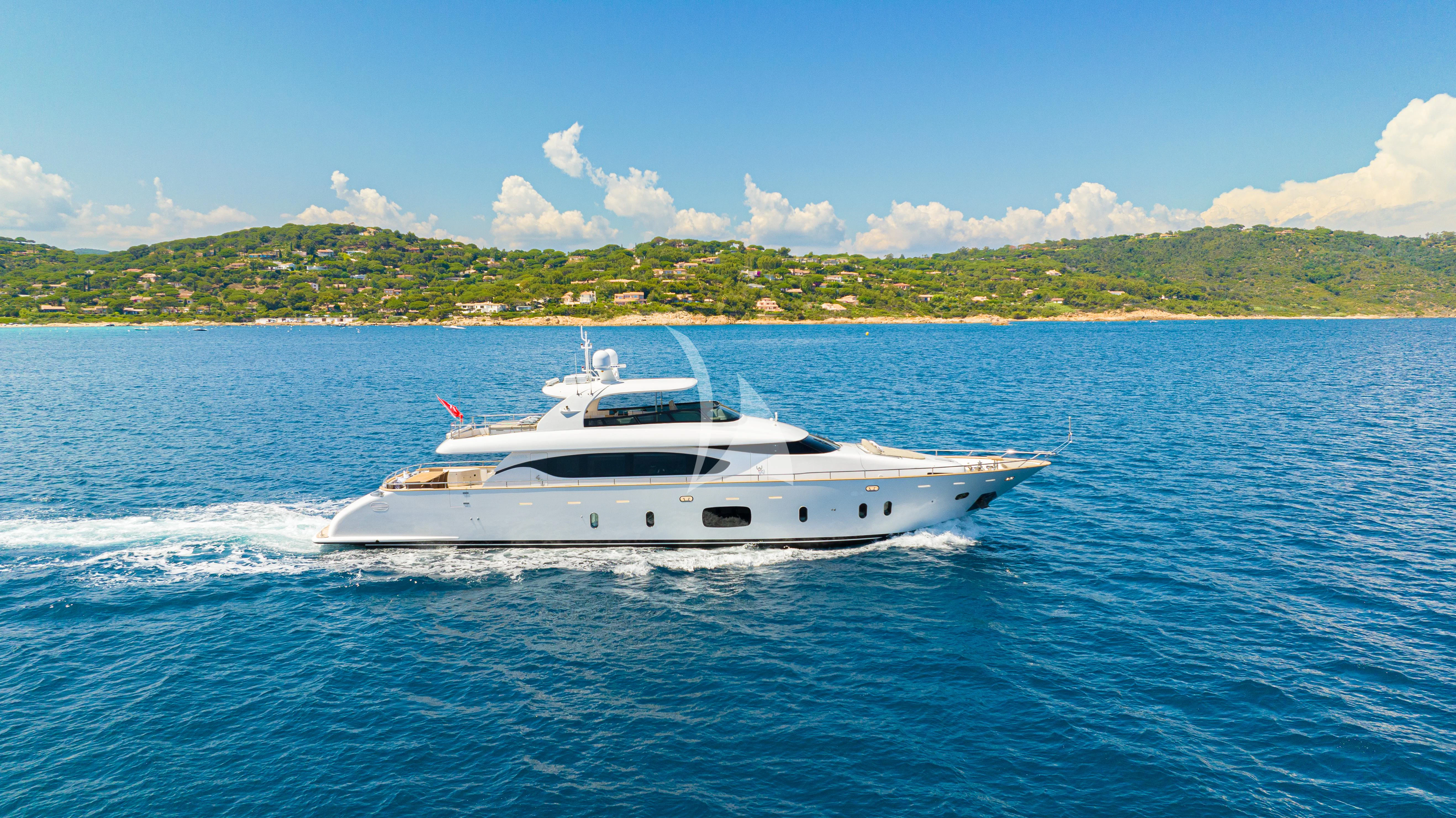 a white yacht on the water aboard DADDY'S DREAM 888 Yacht for Charter