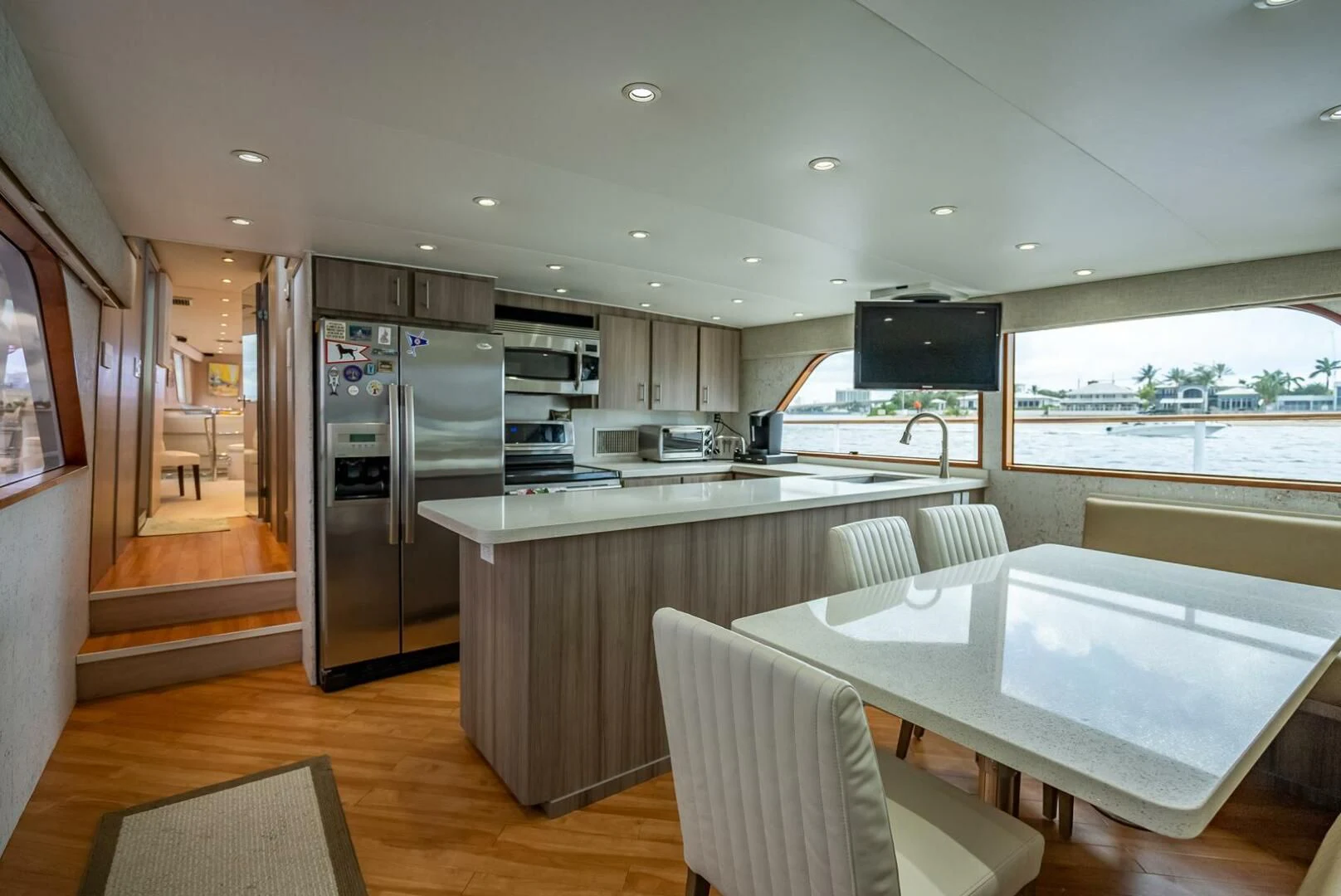 a kitchen with a large dining table aboard MY WAY Yacht for Sale