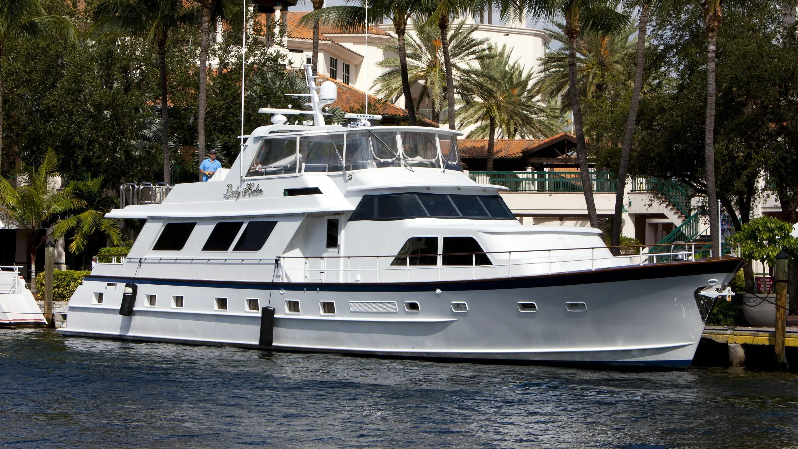 a white yacht in a tropical setting aboard MY WAY Yacht for Sale