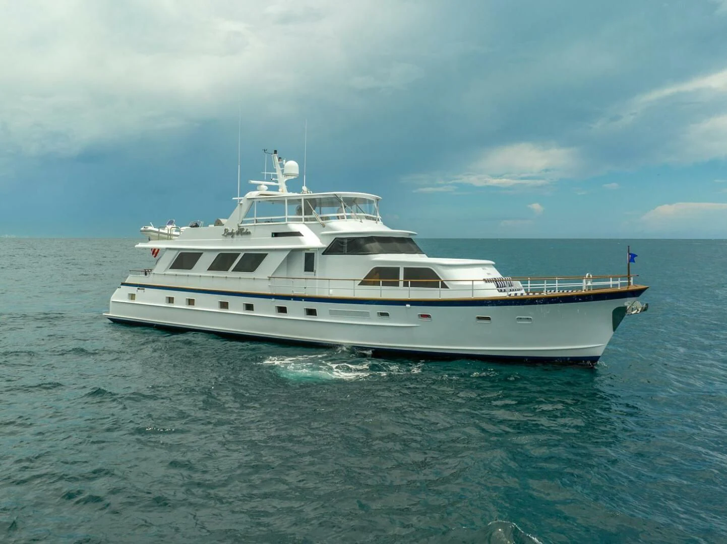 a white yacht in the water aboard MY WAY Yacht for Sale