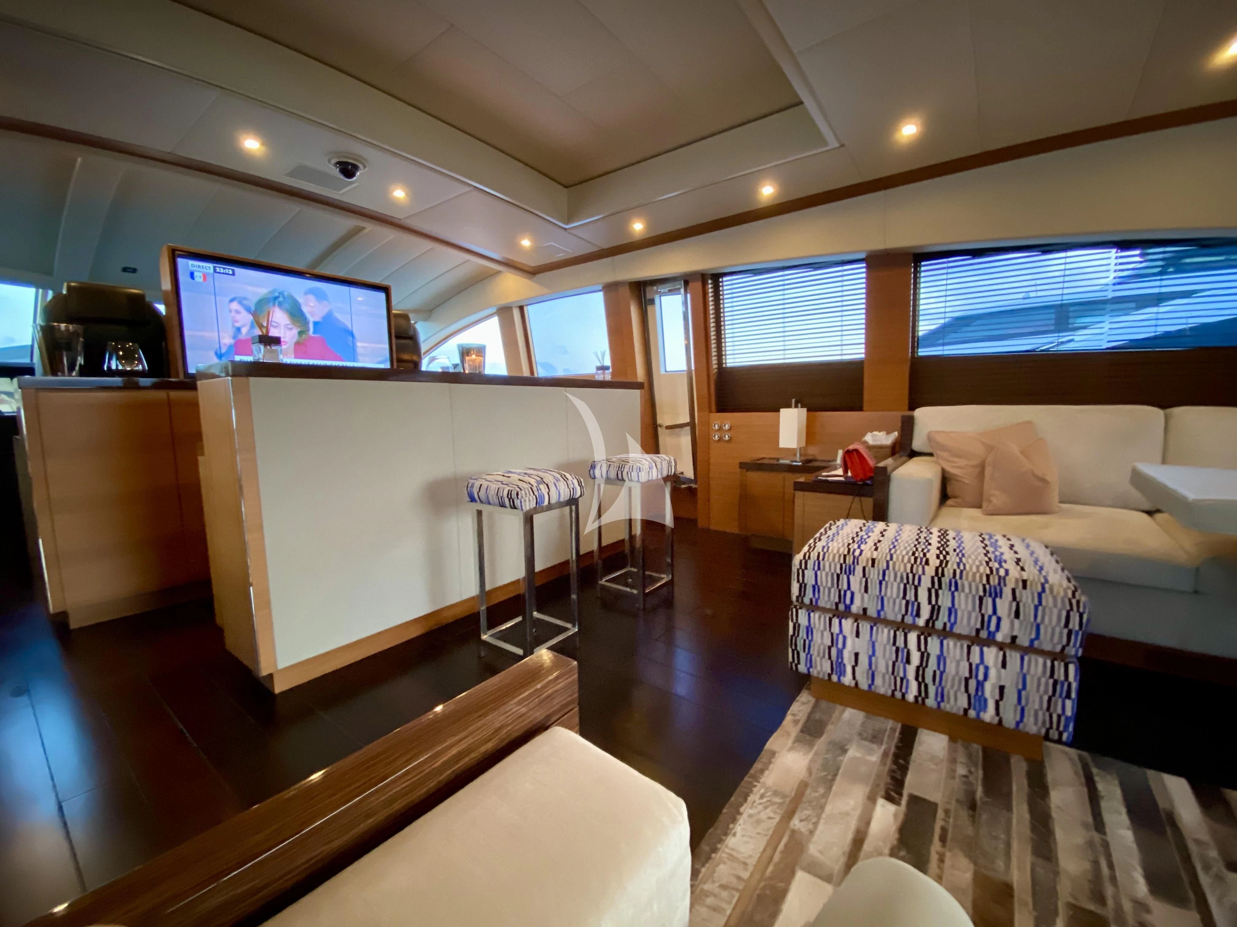 a room with a bed and a tv aboard ECLAT Yacht for Sale