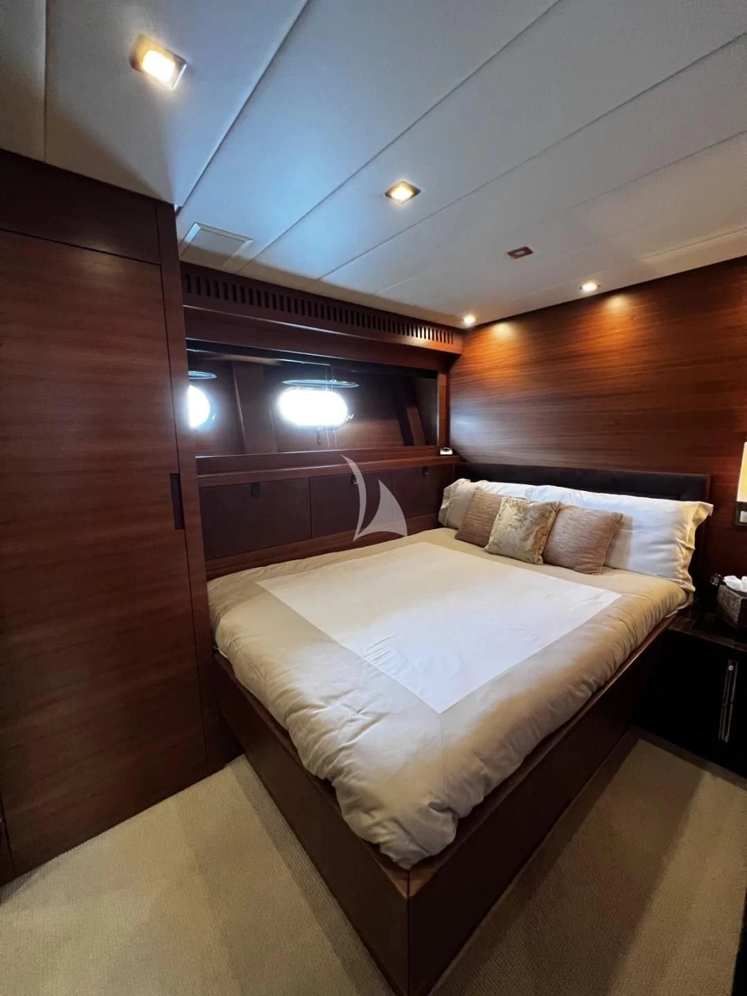 a bed in a room aboard ECLAT Yacht for Sale