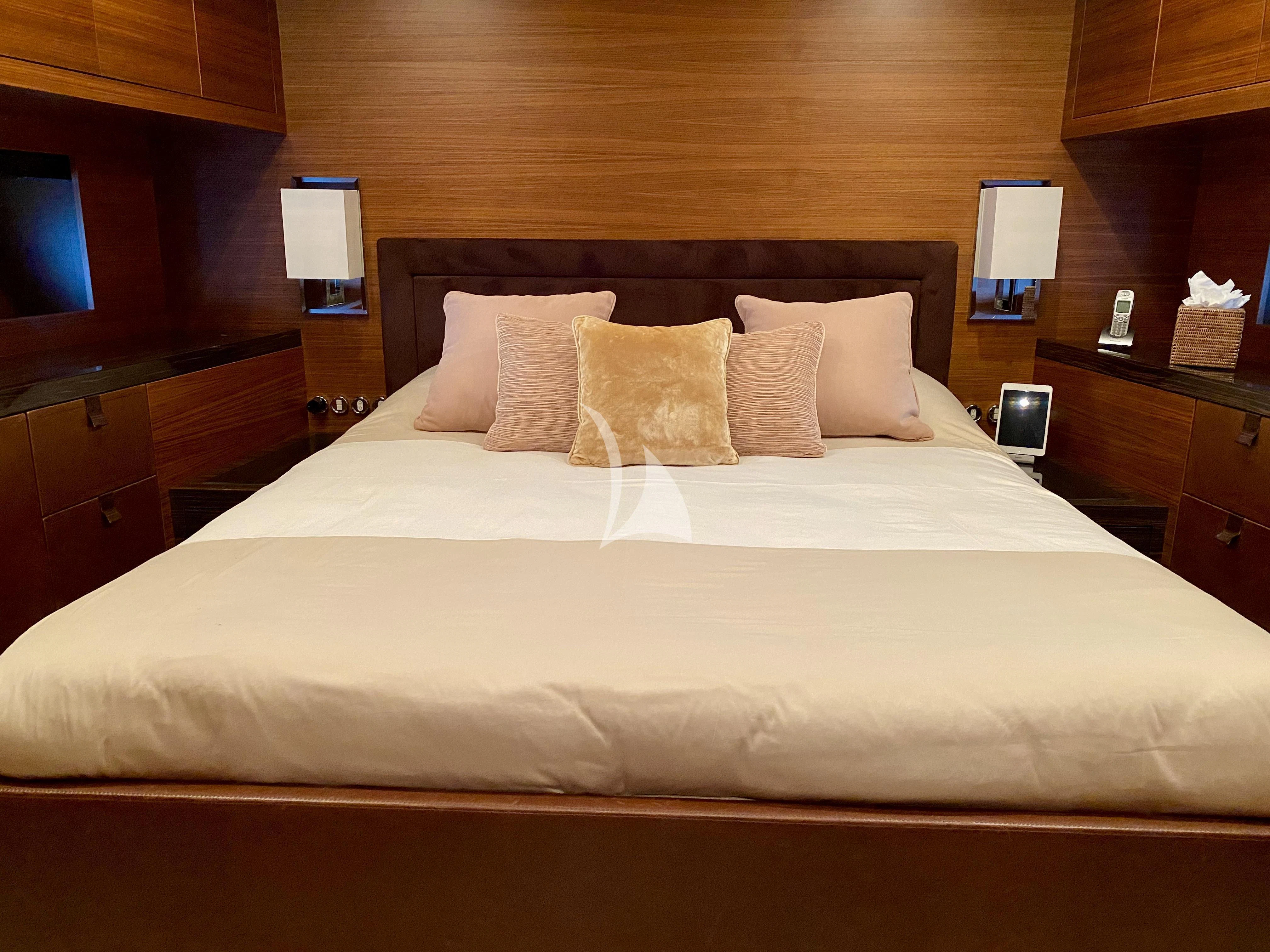 a bed with pillows aboard ECLAT Yacht for Sale