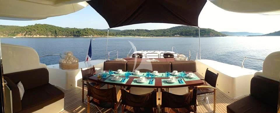 a table on a boat aboard ECLAT Yacht for Sale