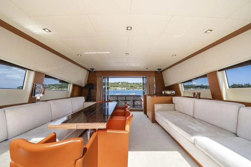 a living room with a couch and a table aboard ECLAT Yacht for Sale