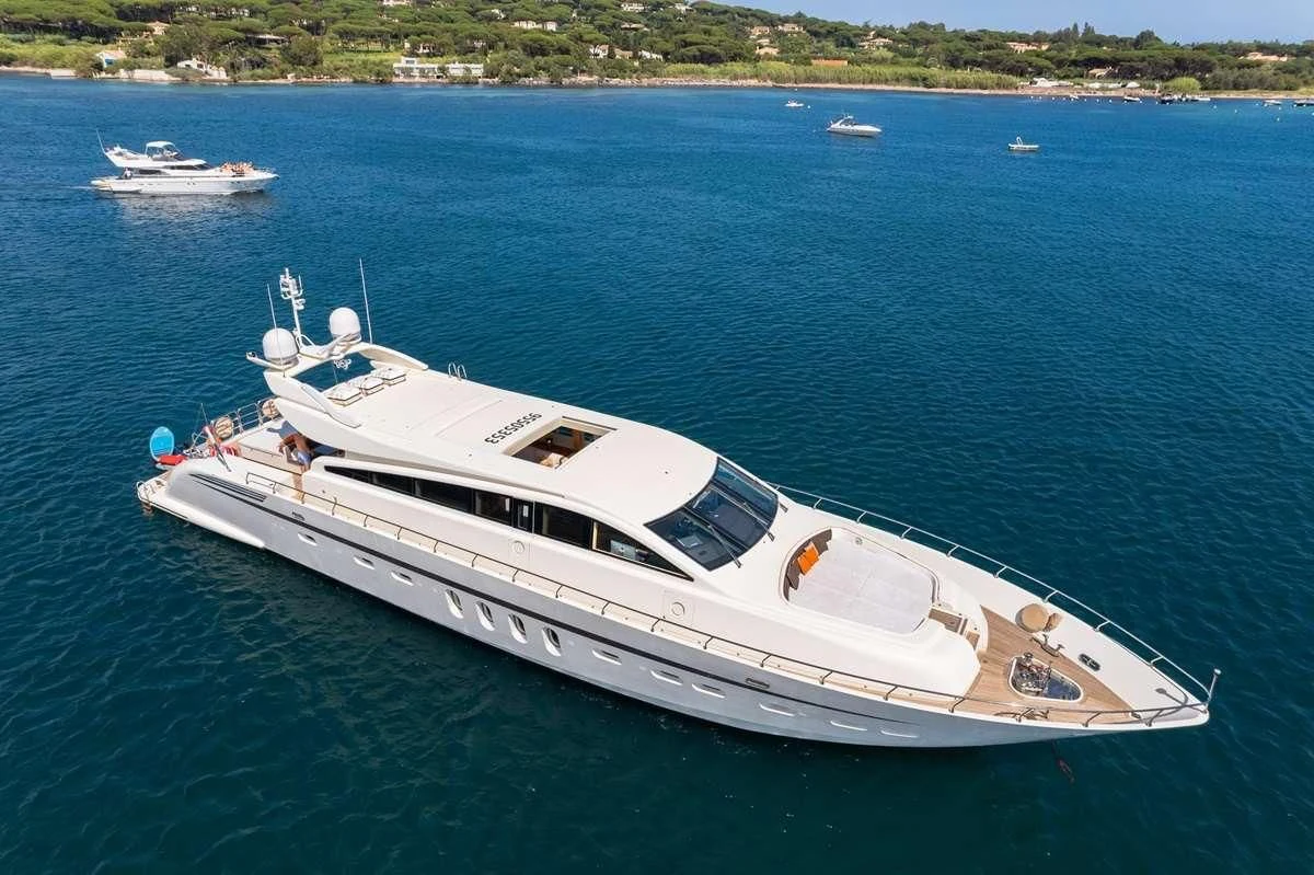 a white yacht in the water aboard ECLAT Yacht for Sale