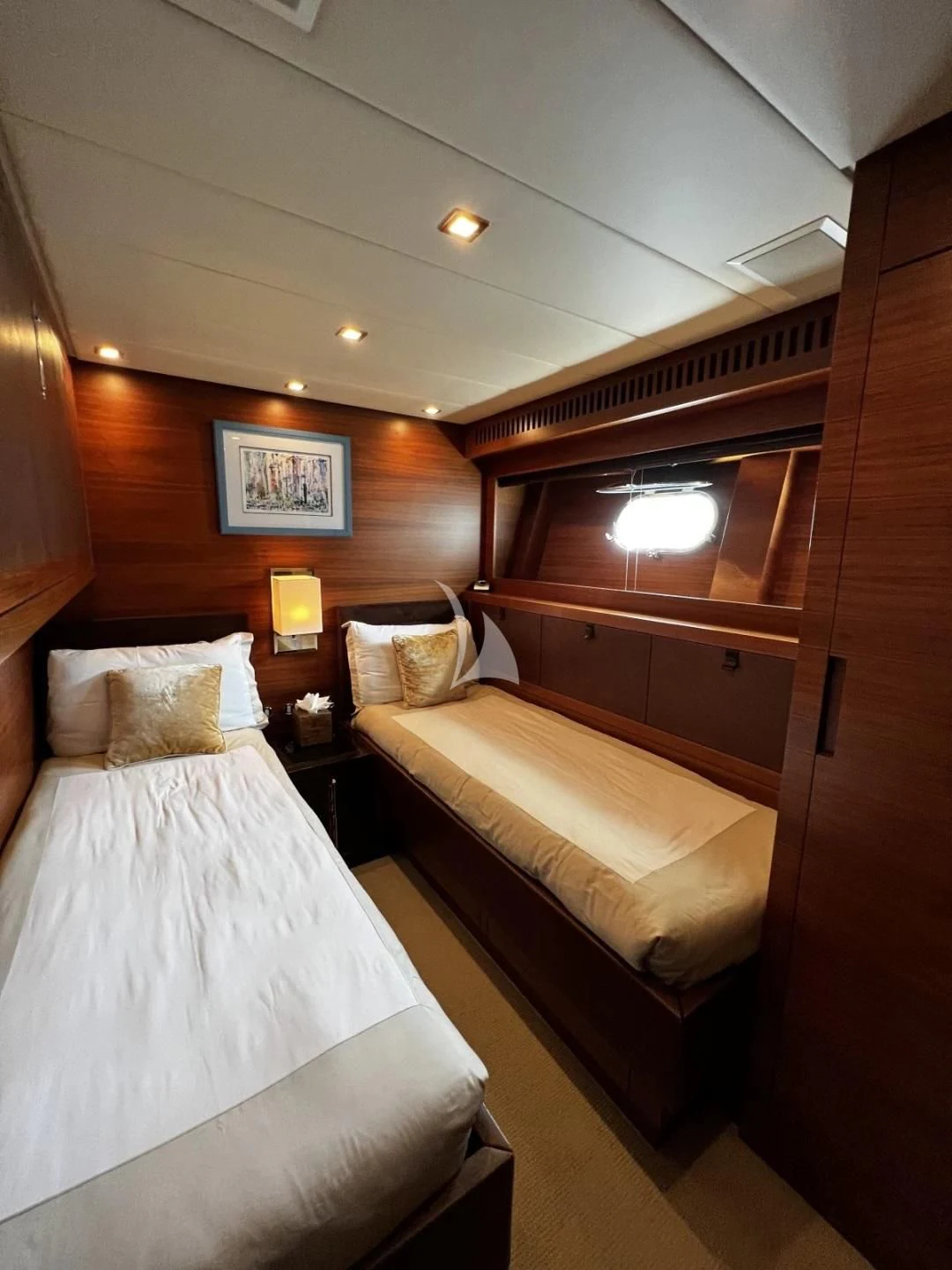 a room with two beds aboard ECLAT Yacht for Sale