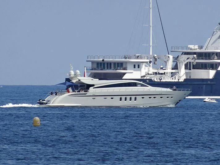 a white boat in the water aboard ECLAT Yacht for Sale