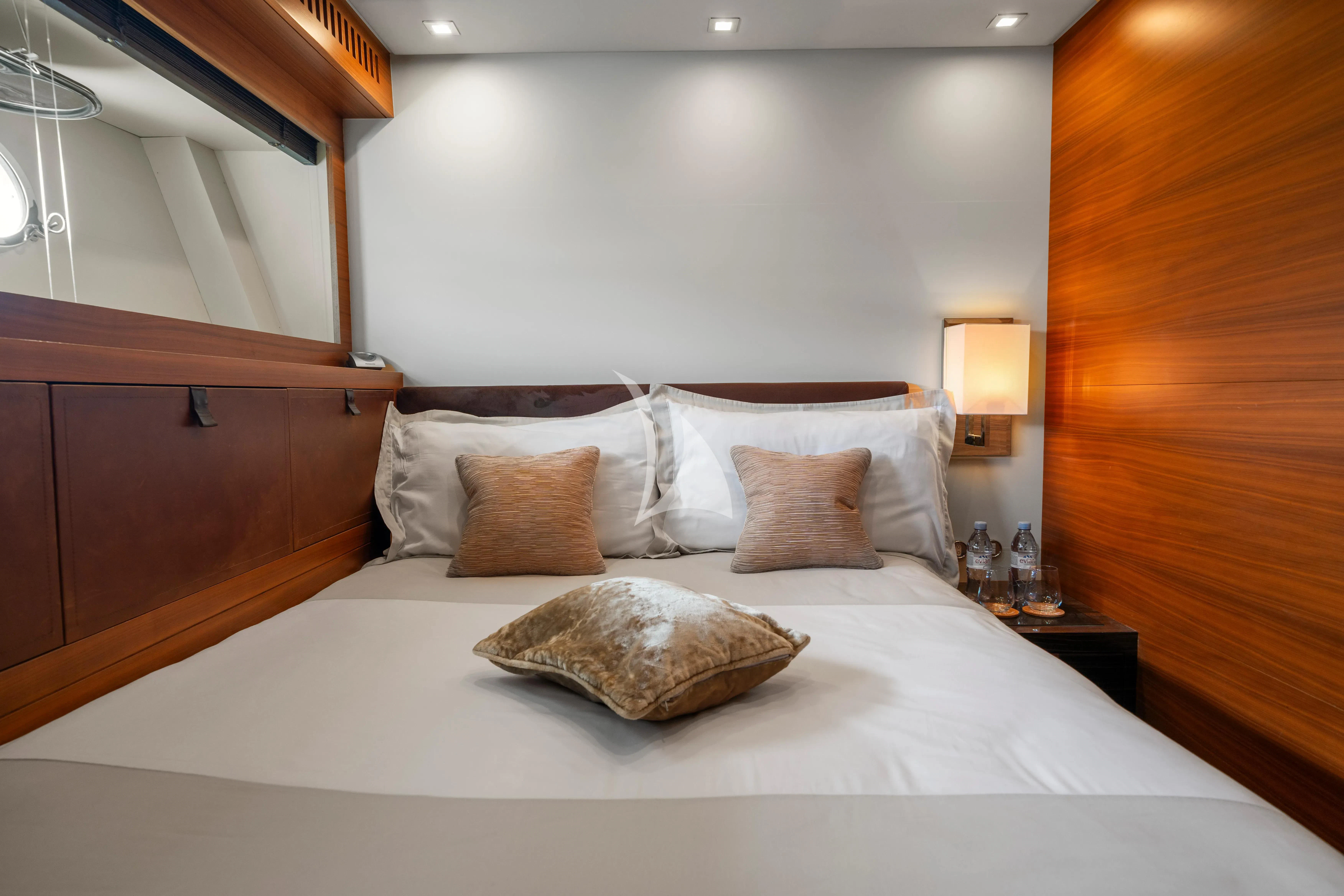 a bed with pillows aboard ECLAT Yacht for Sale