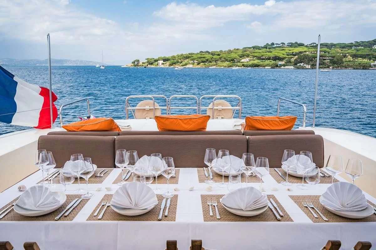 a table set for a dinner aboard ECLAT Yacht for Sale