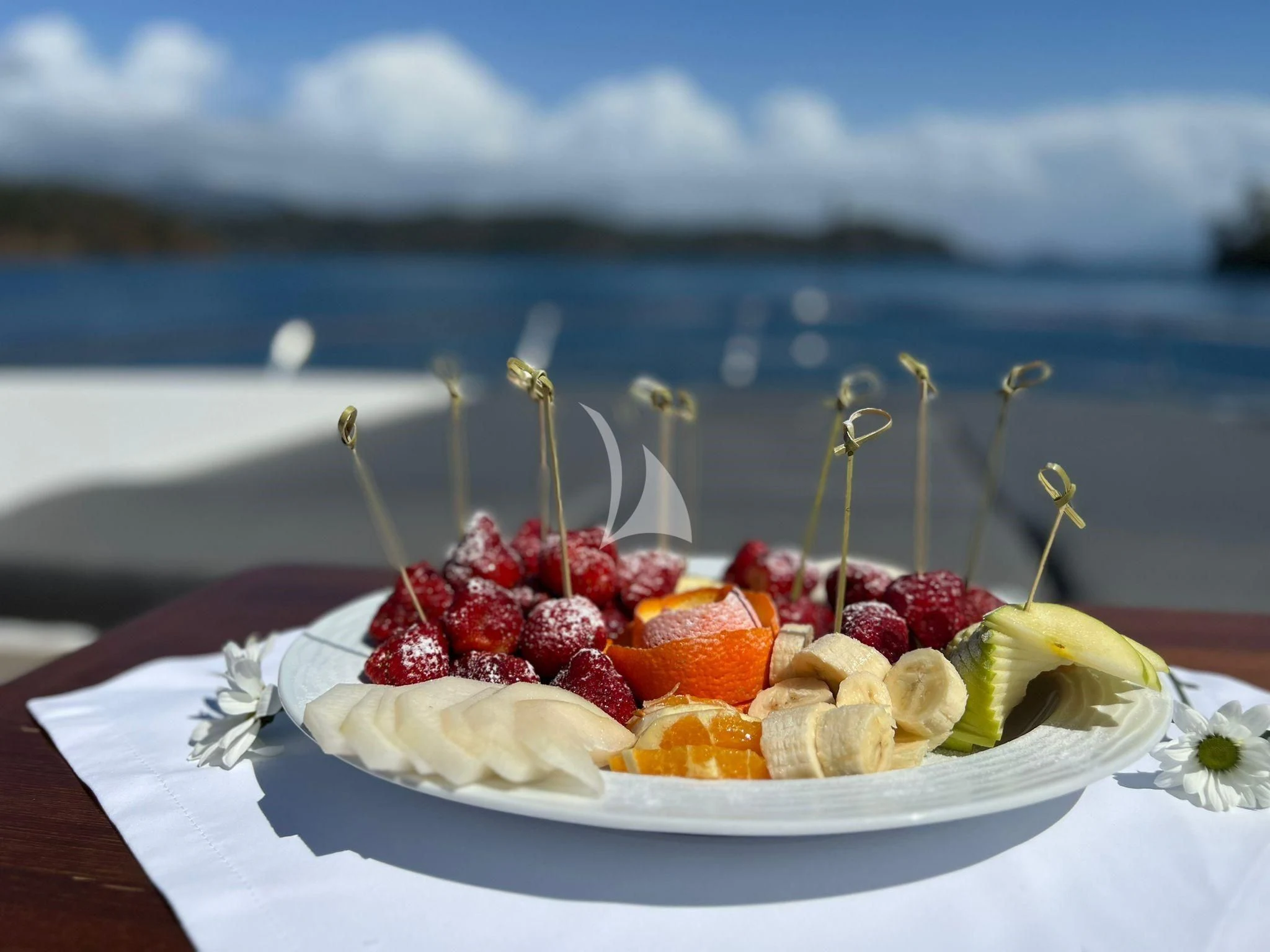 a plate of food aboard HUBO Yacht for Sale