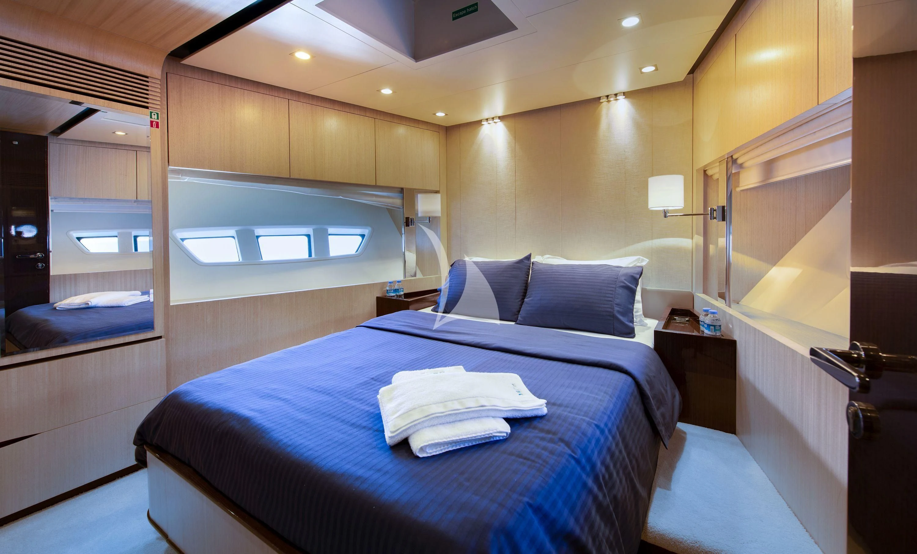 a bed in a room aboard HUBO Yacht for Sale