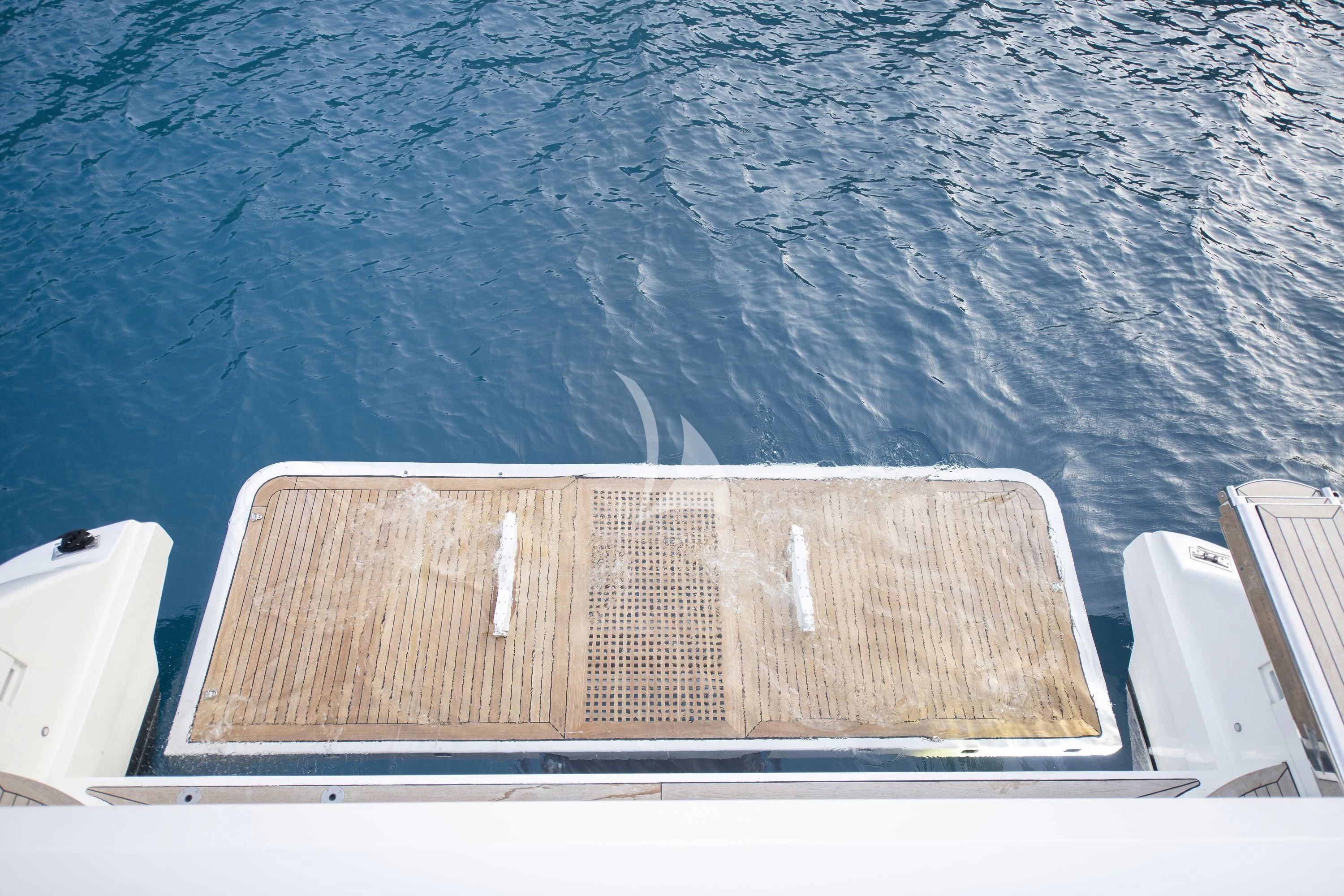 a boat in the water aboard HUBO Yacht for Sale