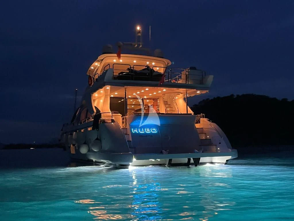 a large boat in the water aboard HUBO Yacht for Sale