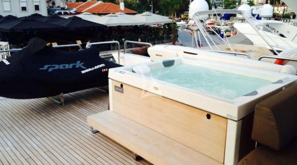 a group of boats on a dock aboard HUBO Yacht for Sale