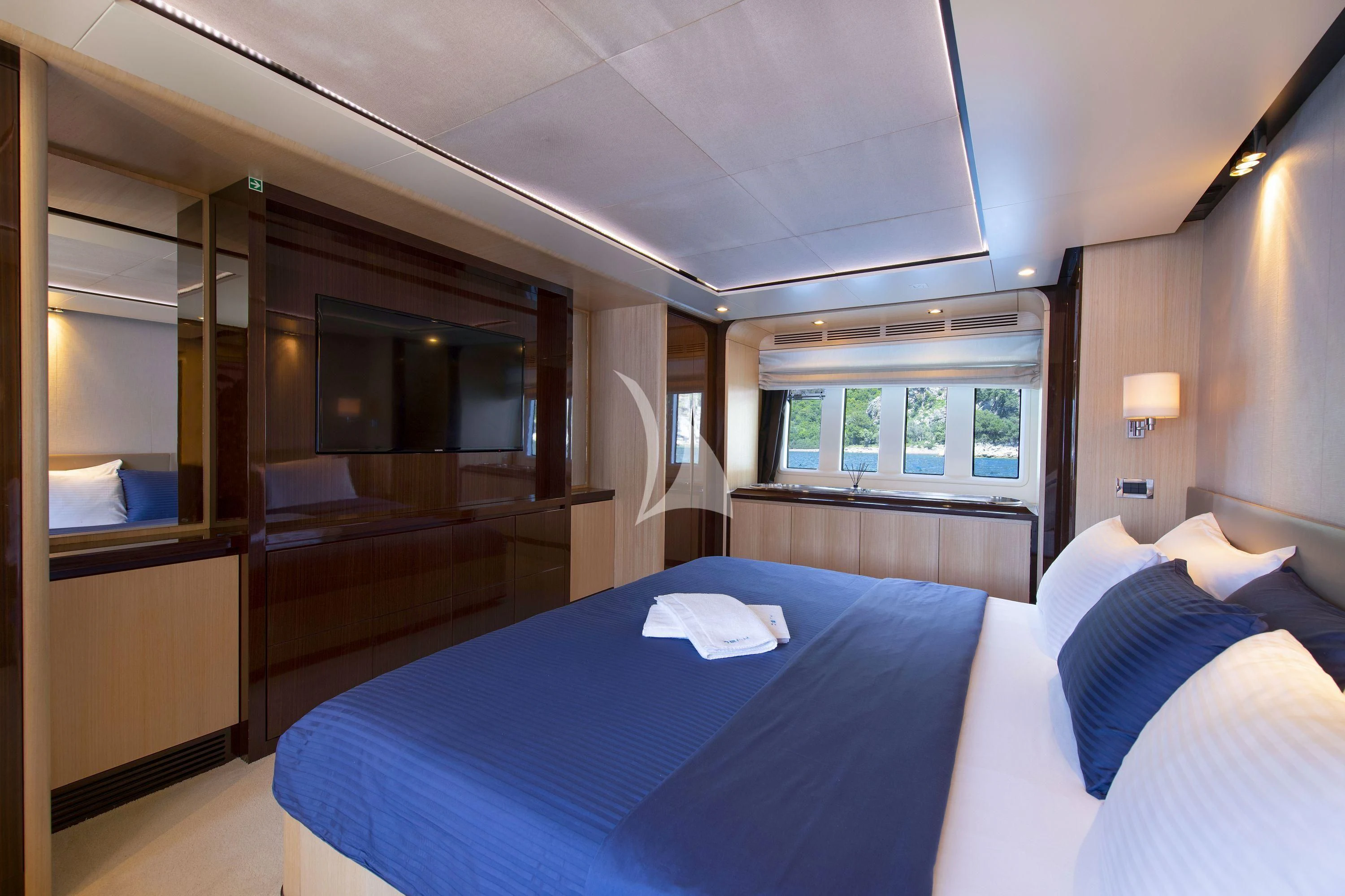 a bed in a room aboard HUBO Yacht for Sale